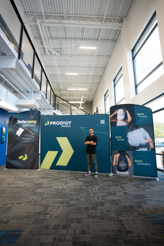 Fabric tension displays and a trade-show back wall set up in the Prodigy showroom in Lindon, Utah